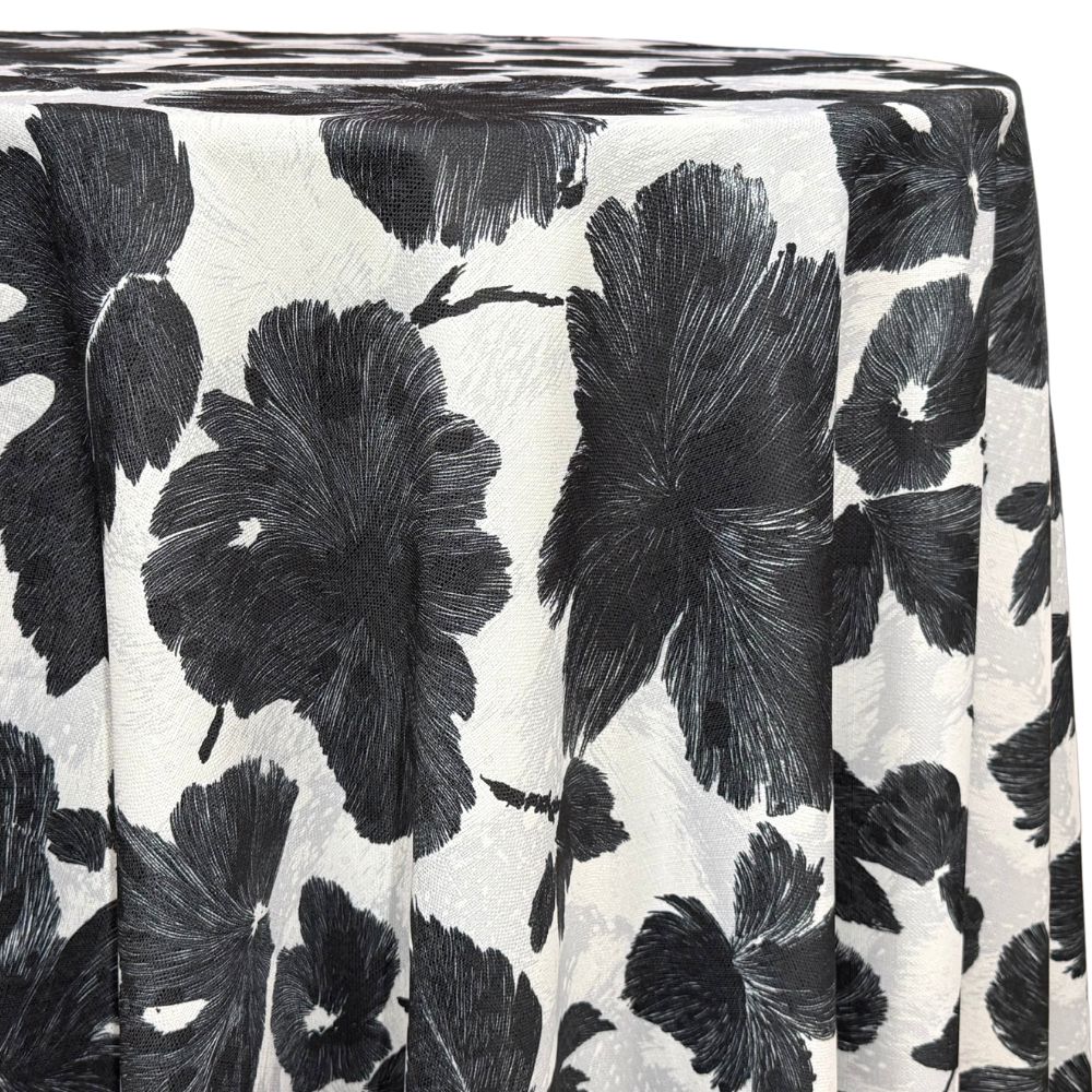 Black and cream tablecloth with large painted floral blooms