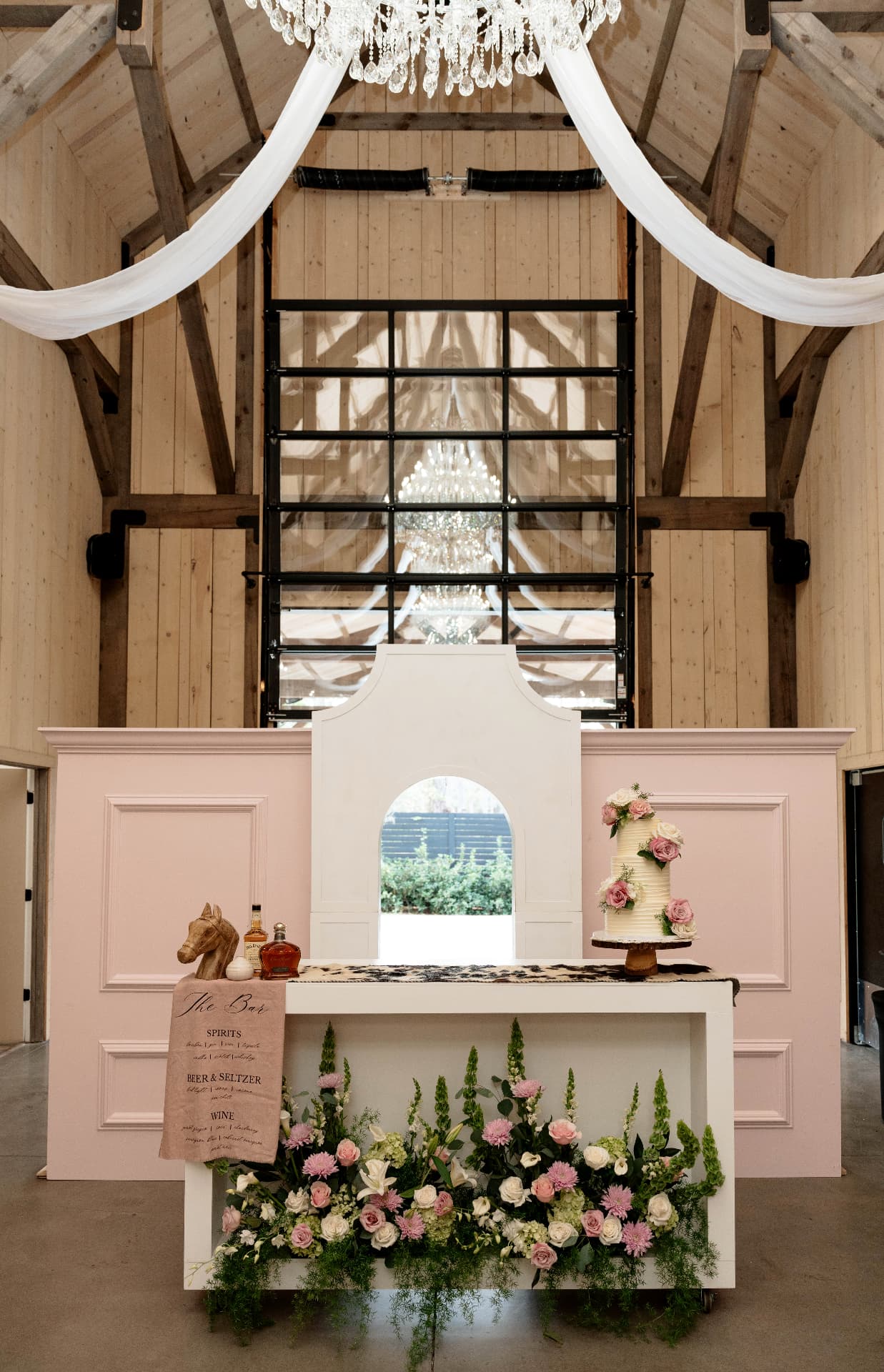 Pink and white bar styled with florals