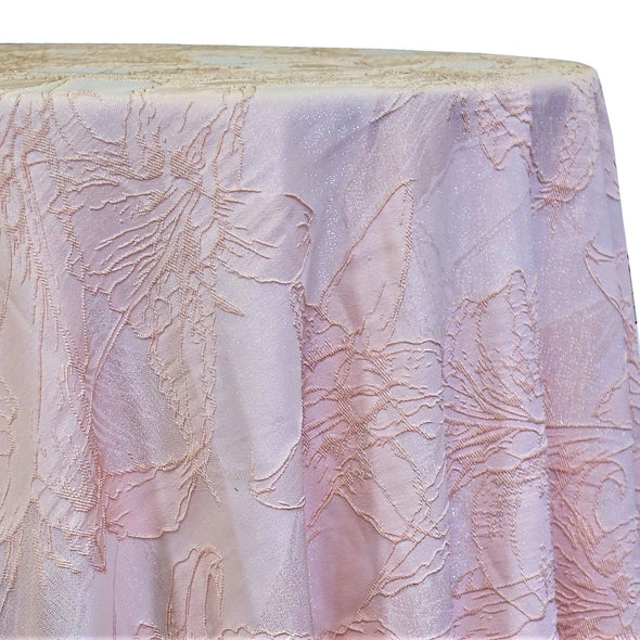 Pale blush tablecloth with a shimmering stitched floral pattern