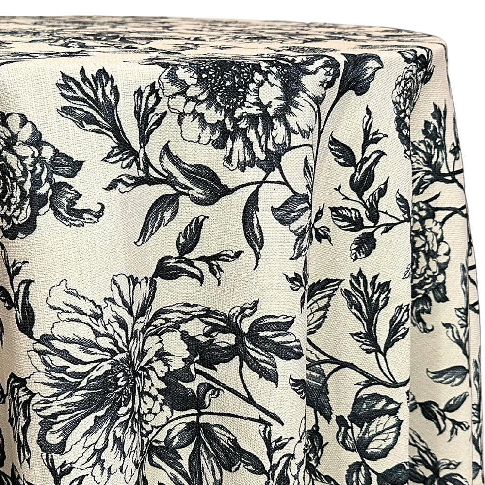 Ivory tablecloth with a black botanical toile pattern