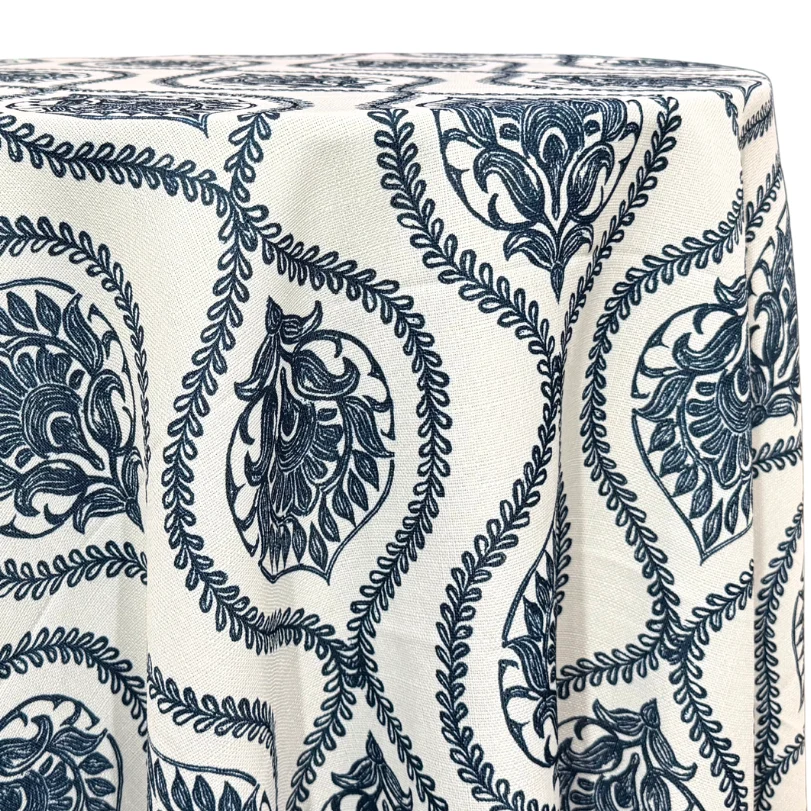 Ivory tablecloth with a navy damask medallion pattern
