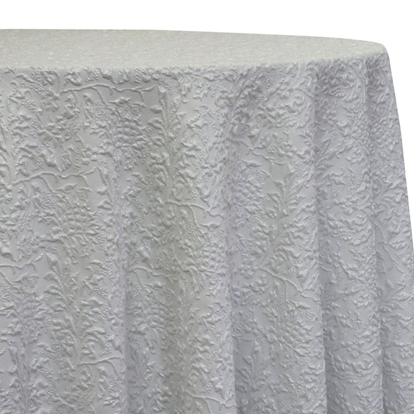 White tablecloth with a raised jacquard leaf pattern
