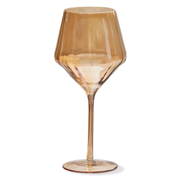Amber toned stemmed goblet with an angular, faceted bowl